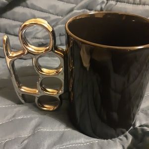 Brass knuckle coffee cup